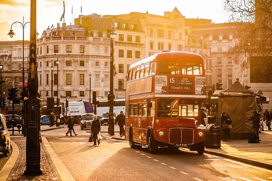 Image of a sunny day in London and a big red London bus