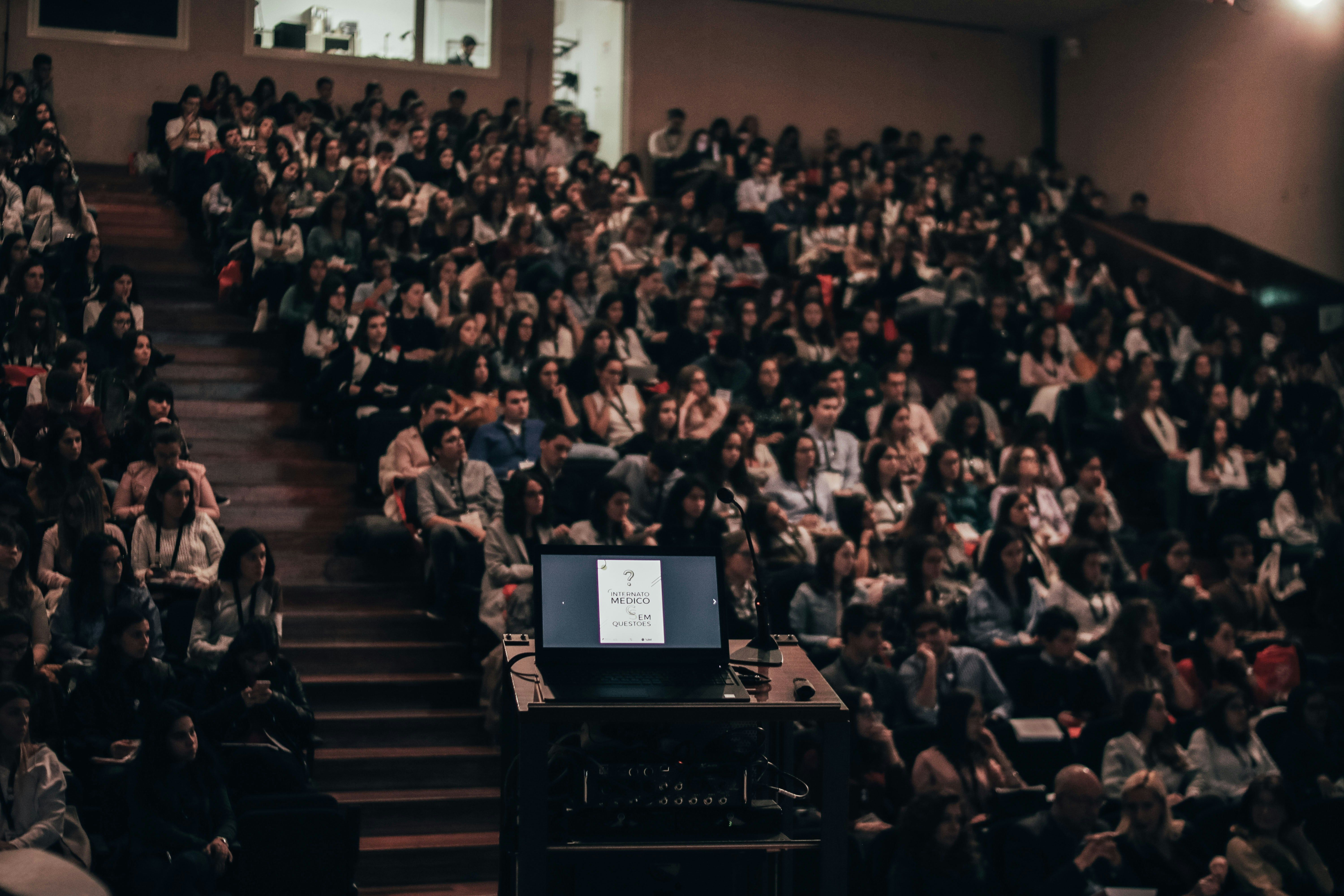 Students sitting at a lecture.