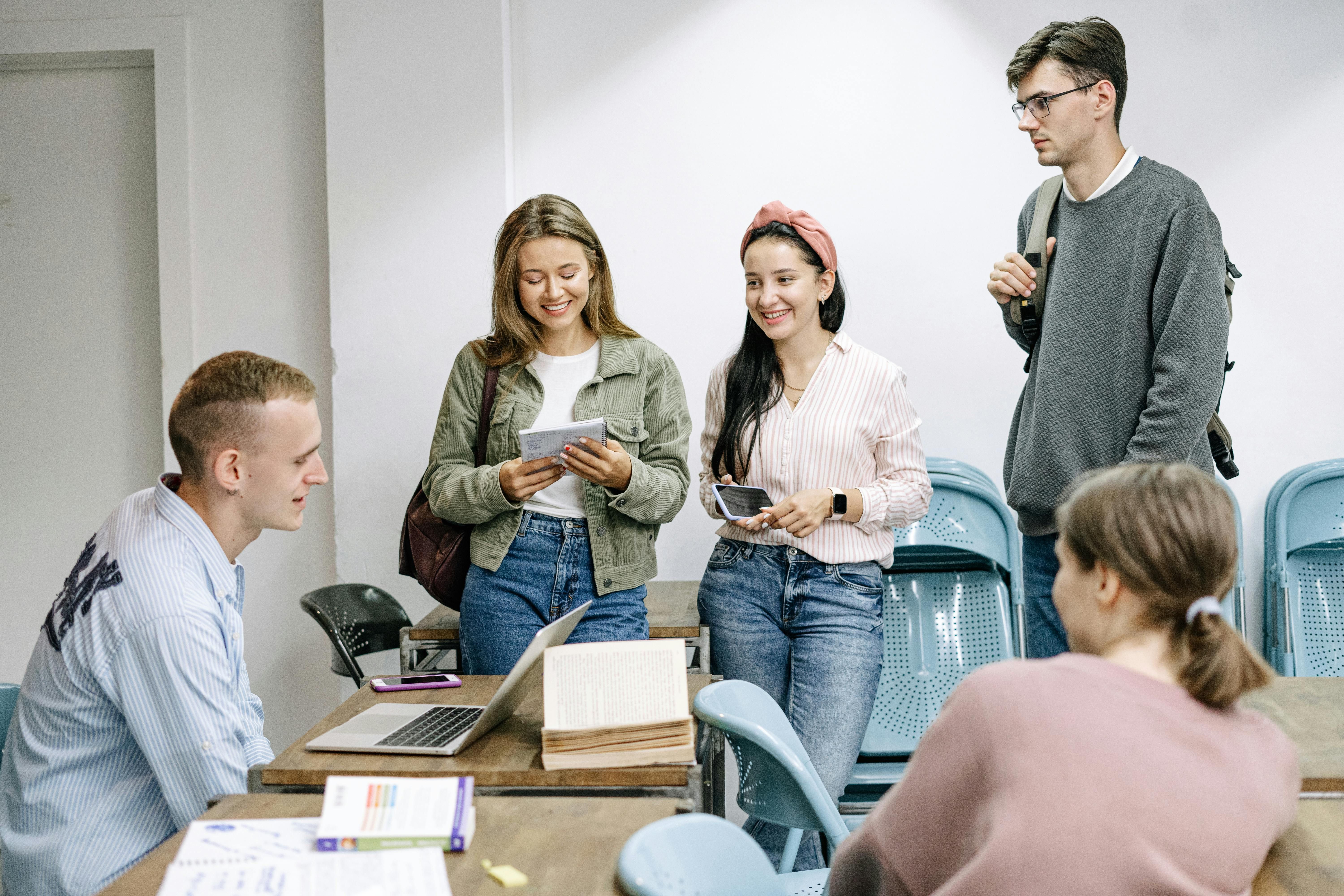 Students talking around a table